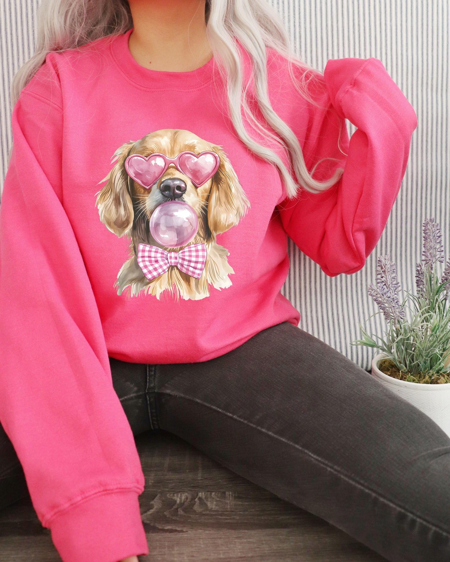 golden retriever wearing pink heart sunglasses, blowing a bubble gum bubble, pink bow png